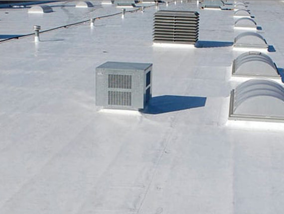 A bright roof top with vents and sun lights